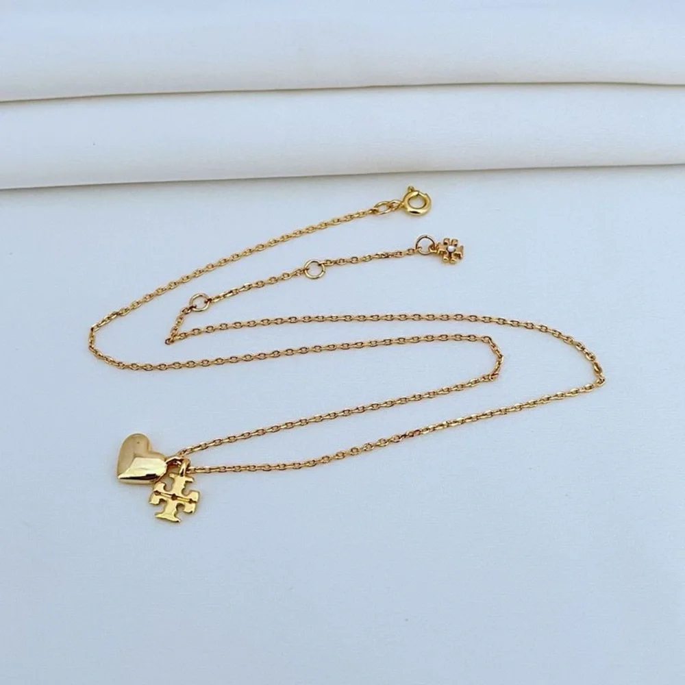 Tory burch Gold Heart and Puzzle Pendant Necklace - Picture 4 of 10